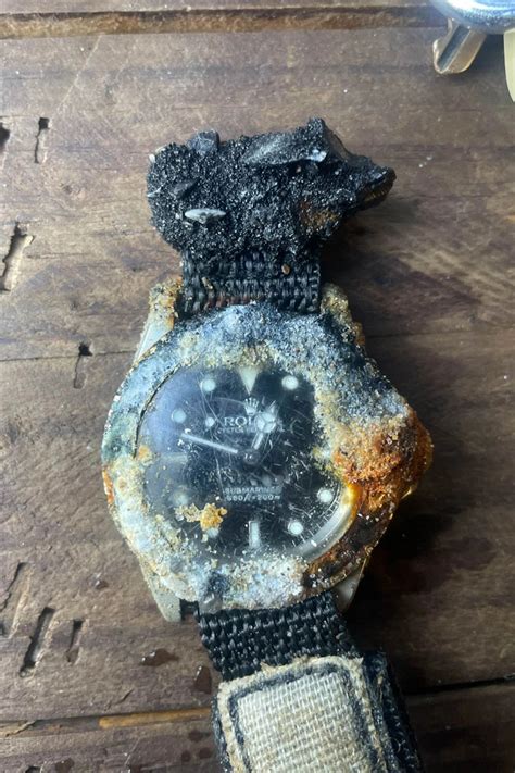 rolex found|Surfer finds lost 52.